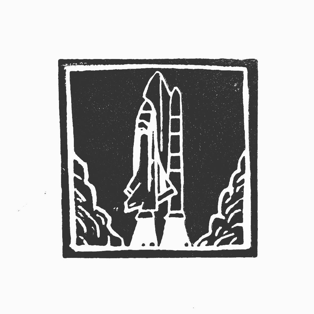 Lino print: a space shuttle and booster rockets on the launch pad between rocky outcrops